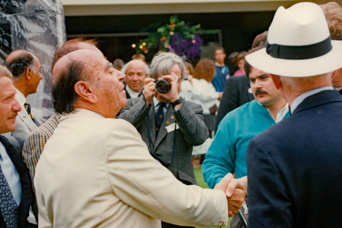 Bertone shaking hands
